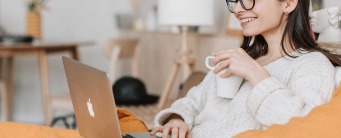 lady drinking coffee and talking online